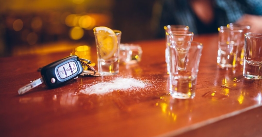 tequila shots on bar with car keys