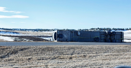 overturned truck on the highway