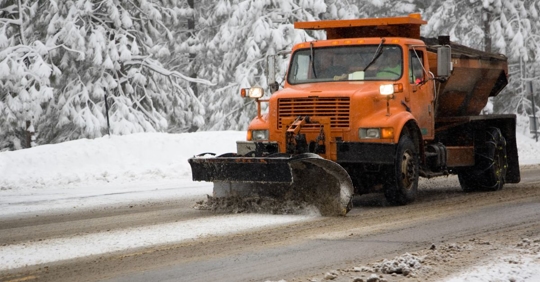 Snow plow on street