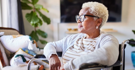 Woman in a wheelchair thinking about her options after being involved in a car accident.