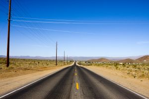 photo of an empty desert road