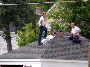 159890_men_on_roof.jpg