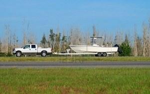 1779493-truck-towing-boat.jpg